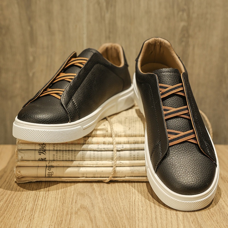 Zapatos de hombre de un pie de zapato 2025 primavera nuevos zapatos casuales de skate para hombres zapatos blancos sin correa estudiantes adolescentes