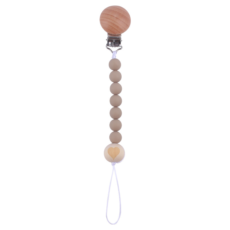 Nuevos suministros para bebés clip de chupete de haya creativo bebé DIY patrón de dibujos animados cuentas de madera Cadena de chupete cadena anti-caída