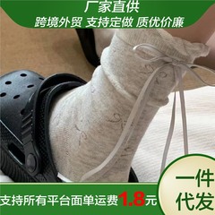 夏の仙仙シリーズの三色の蝶結びの透かし彫りのかかとのリボンのデザインinsの泡のレースの中筒の靴下の少女