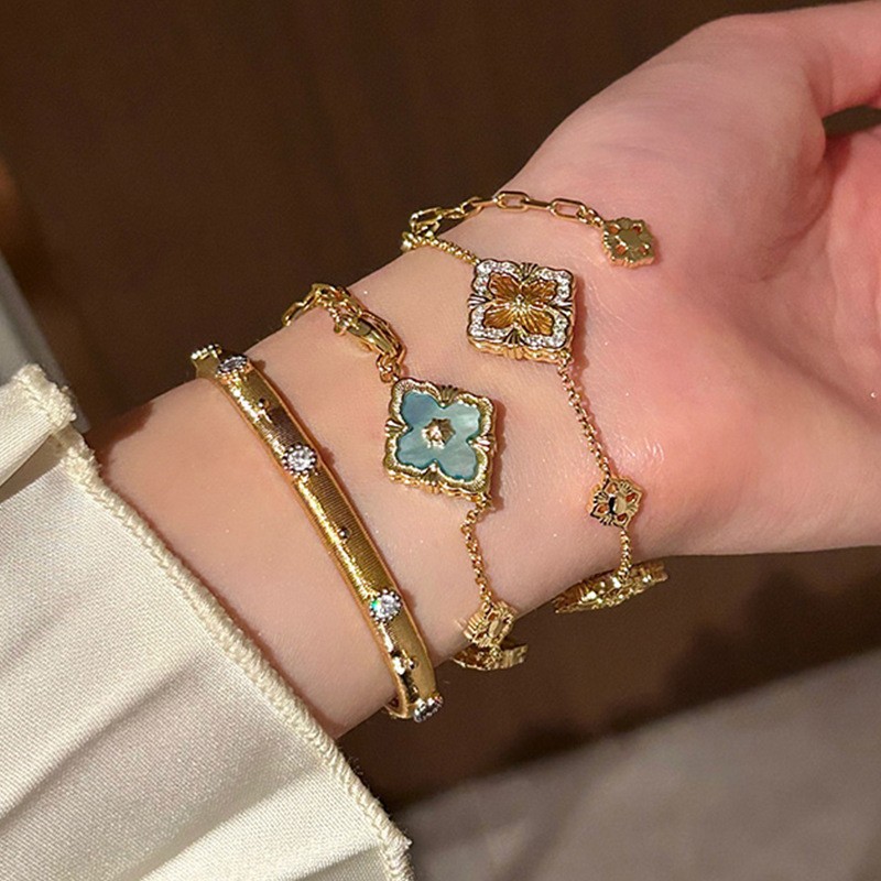 Pulsera de flores de metal transfronteriza europea y americana, nicho femenino, sentido de alta gama, pulsera simple y versátil, accesorios de joyería de lujo ligeros de moda