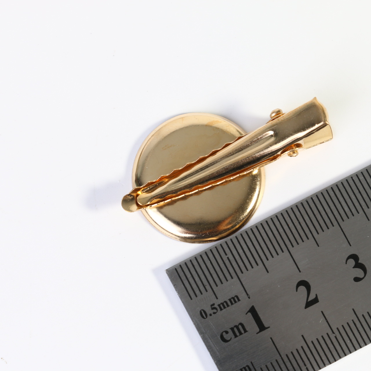 2.4" disc with 4.2cm gold clamping ring
