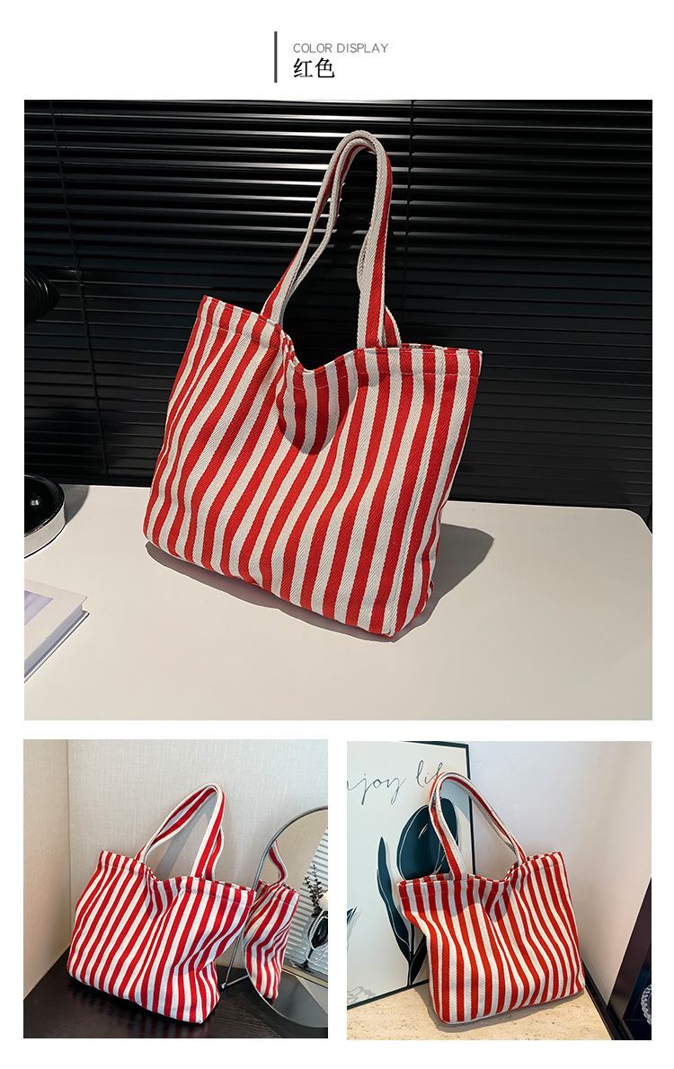 2024 Autumn/Winter new versatile and fashionable striped handbag shopping bag, two-tone large-capacity trendy single-shoulder bag undefined