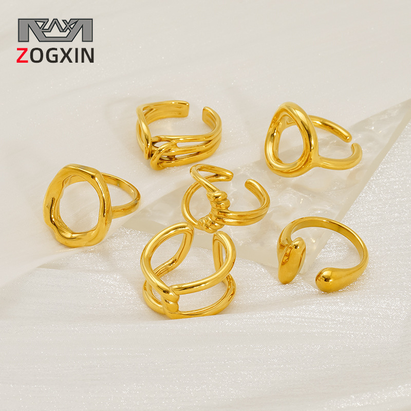 Diseño sentido geométrico anillo de anillo hueco de acero inoxidable al por mayor transfronterizo europeo y americano anudado cruzado anillo de acero de titanio femenino