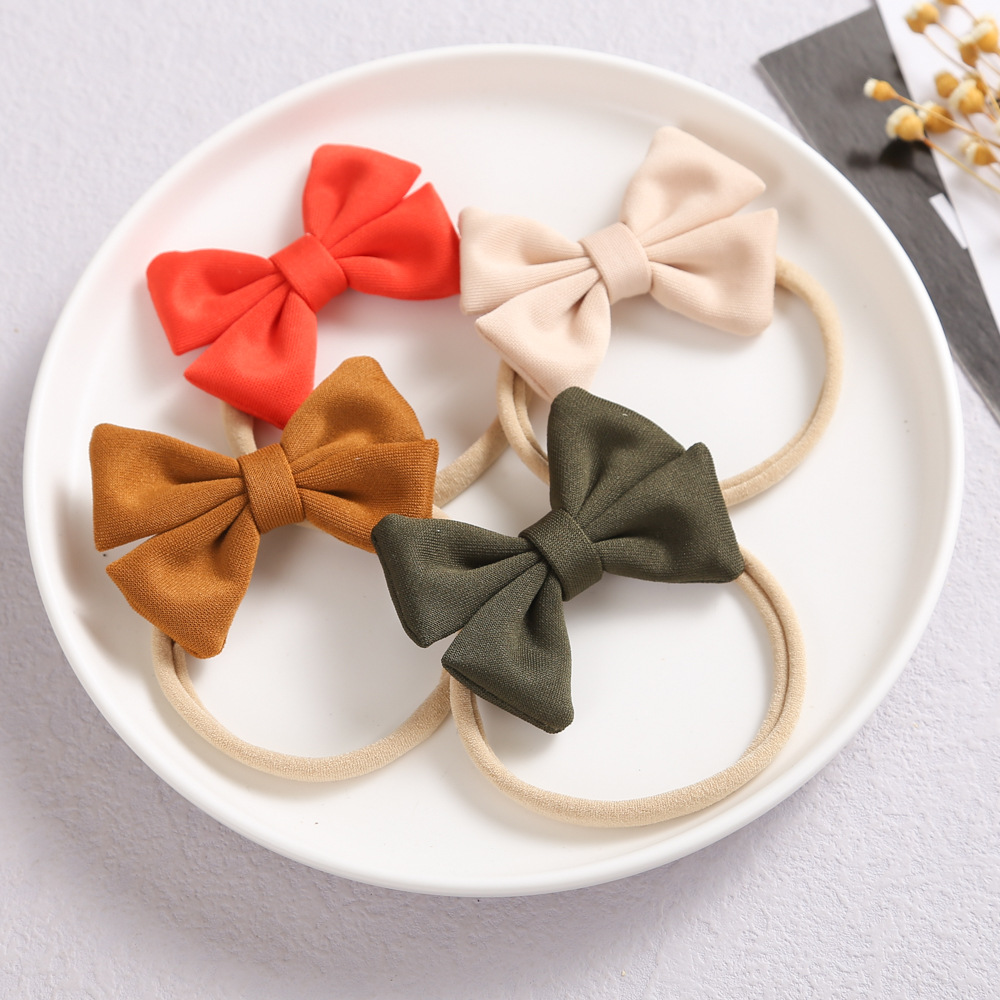 Comércio exterior malha confortável algodão artesanal bolsa cintura arco cocar europeu e americano cor de pele macio náilon elástico bebê cabeça anel_voghion.com