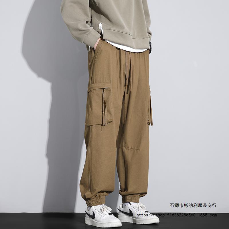 Nuevos pantalones de trabajo de alta calidad de primavera para hombres, moda multibolsillos con tendencia universal