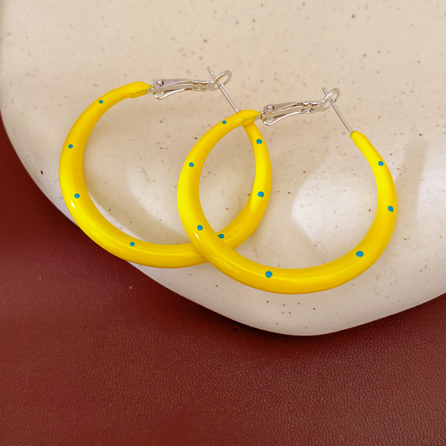 Aguja de plata amarilla goteo de aceite punto de onda aretes redondos simple moda aretes ligeros de lujo alta sensación de aretes al por mayor