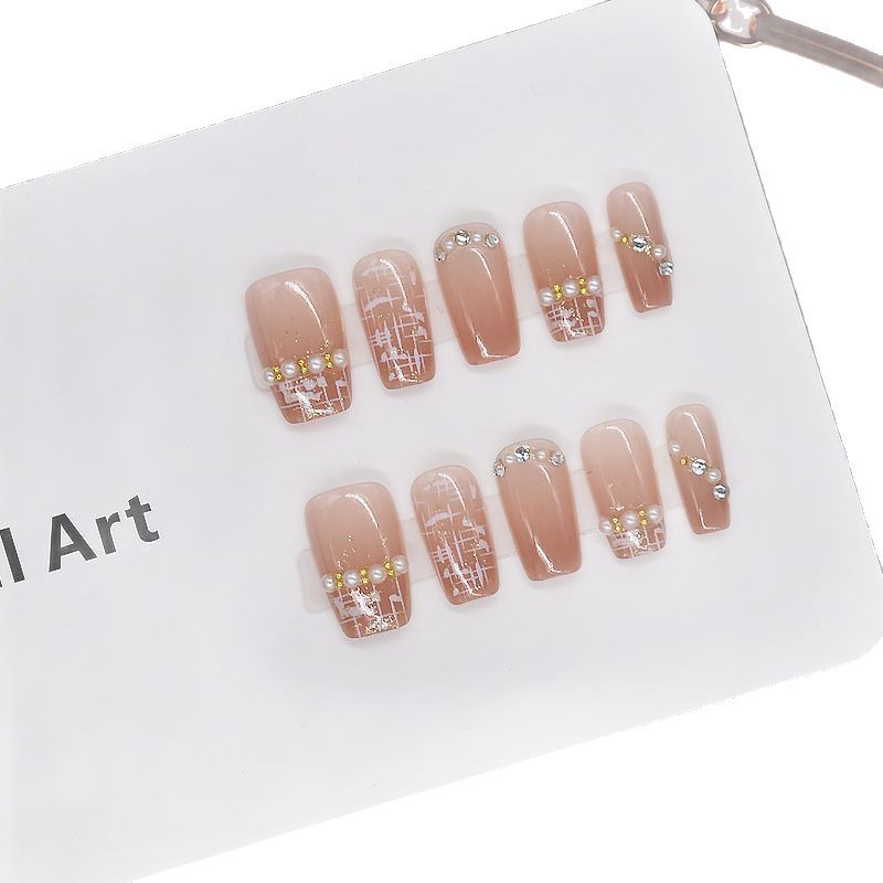 10 piezas de primavera <unk> viento manicure parche manicure falso manicure al por mayor productos terminados desmontables blanqueamiento explosivo usar uñas