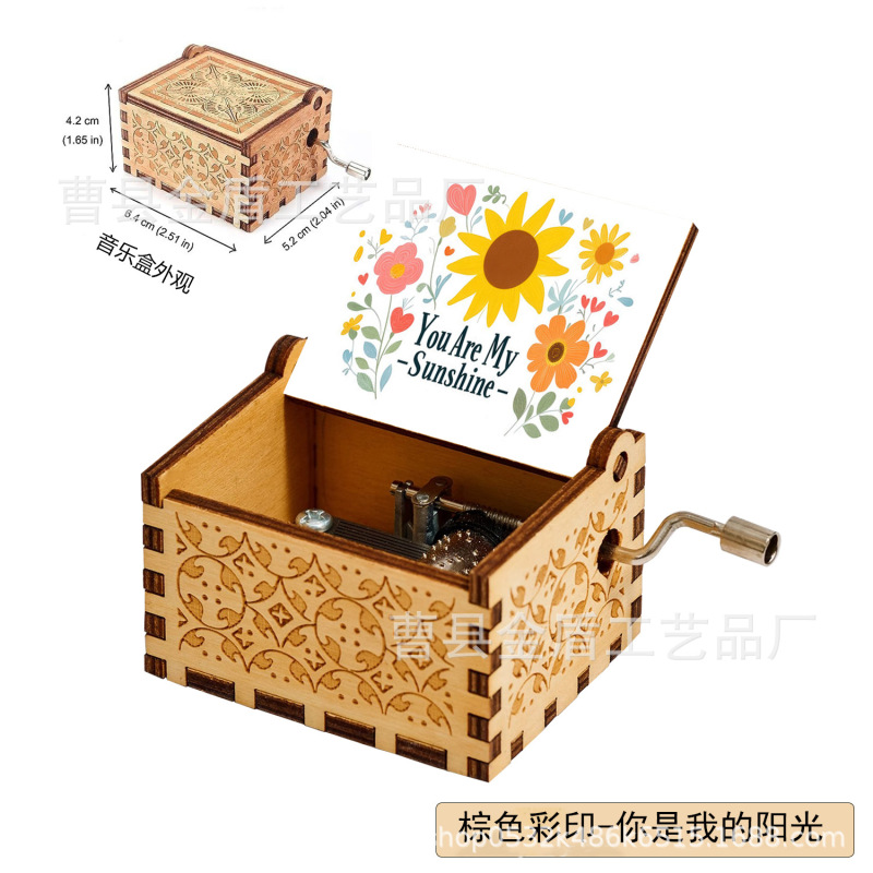 木製の手で音楽箱のアイデアを揺らします。|undefined