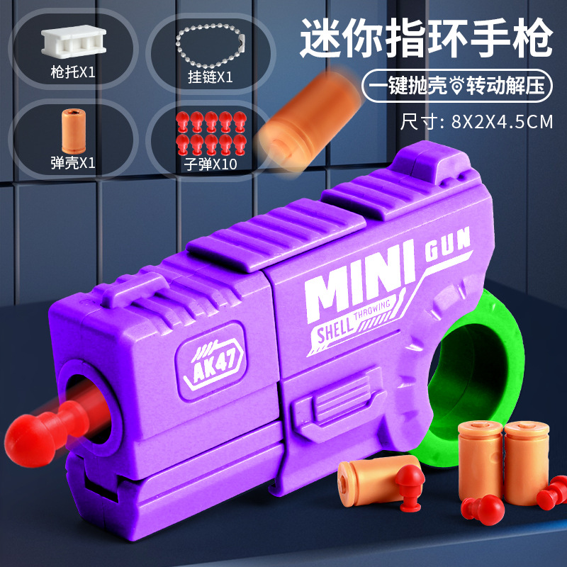 Mini dedo para niños, anillo de descompresión, pistola giratoria, puede lanzar proyectiles, juguetes geniales, juguetes novedosos para niños al por mayor