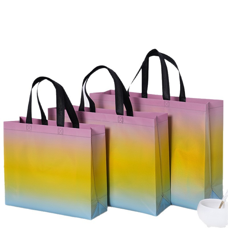Bolsas de tela no tejida con película láser de tres colores de alta calidad, bolsas para hombres y mujeres de alto valor, grosor personalizado LOGO