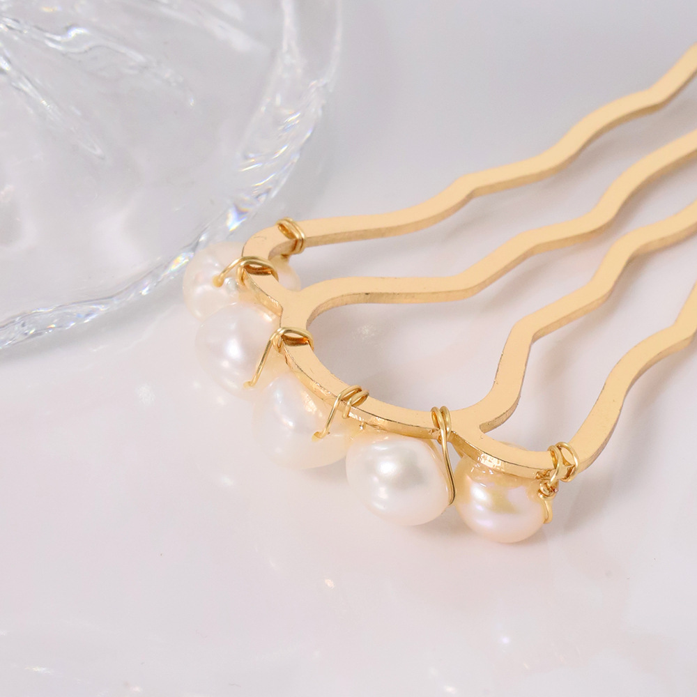Perla de alta sensación en forma de U clip de cabello bola cabeza fija artefacto clip de cabello nuevo peine de cuatro dientes joyas al por mayor image 4