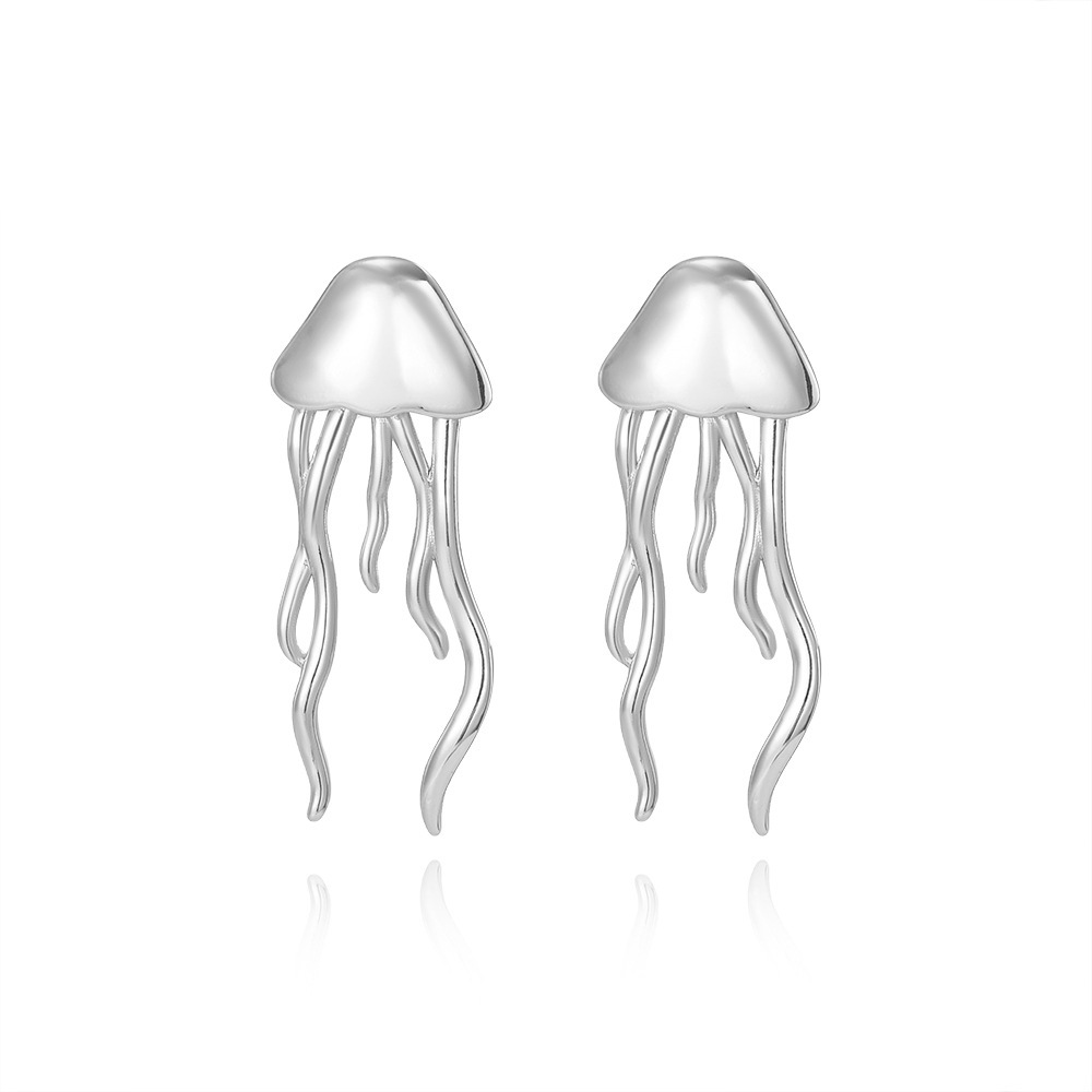 Pendientes brillantes de acero de titanio chapados en oro con forma de medusa, estilo INS, sencillos, elegantes y con personalidad, con borlas, a la moda.