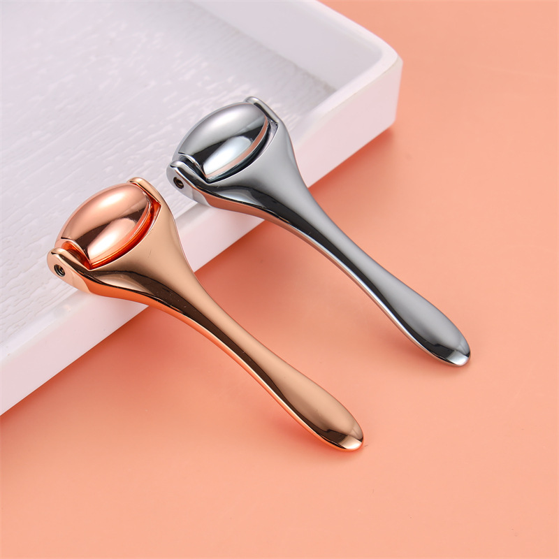 Rodillo metálico para crema de ojos, stick masajeador manual para lifting y reafirmación del contorno de ojos