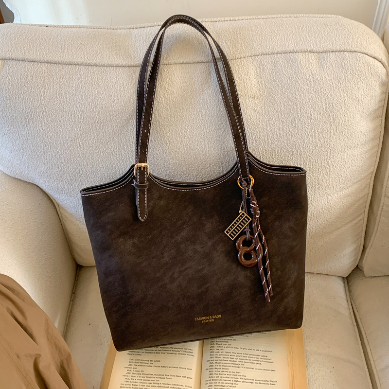 Bolsa de gran capacidad para mujeres 2026 nueva moda bolso de hombro de mujer alta textura versátil bolso de mujer de viaje mate