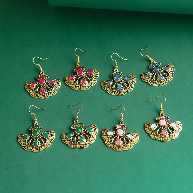 Fashion Hollow Fan-shaped Peacock Geometric Drop Earrings Wholesale display picture 1