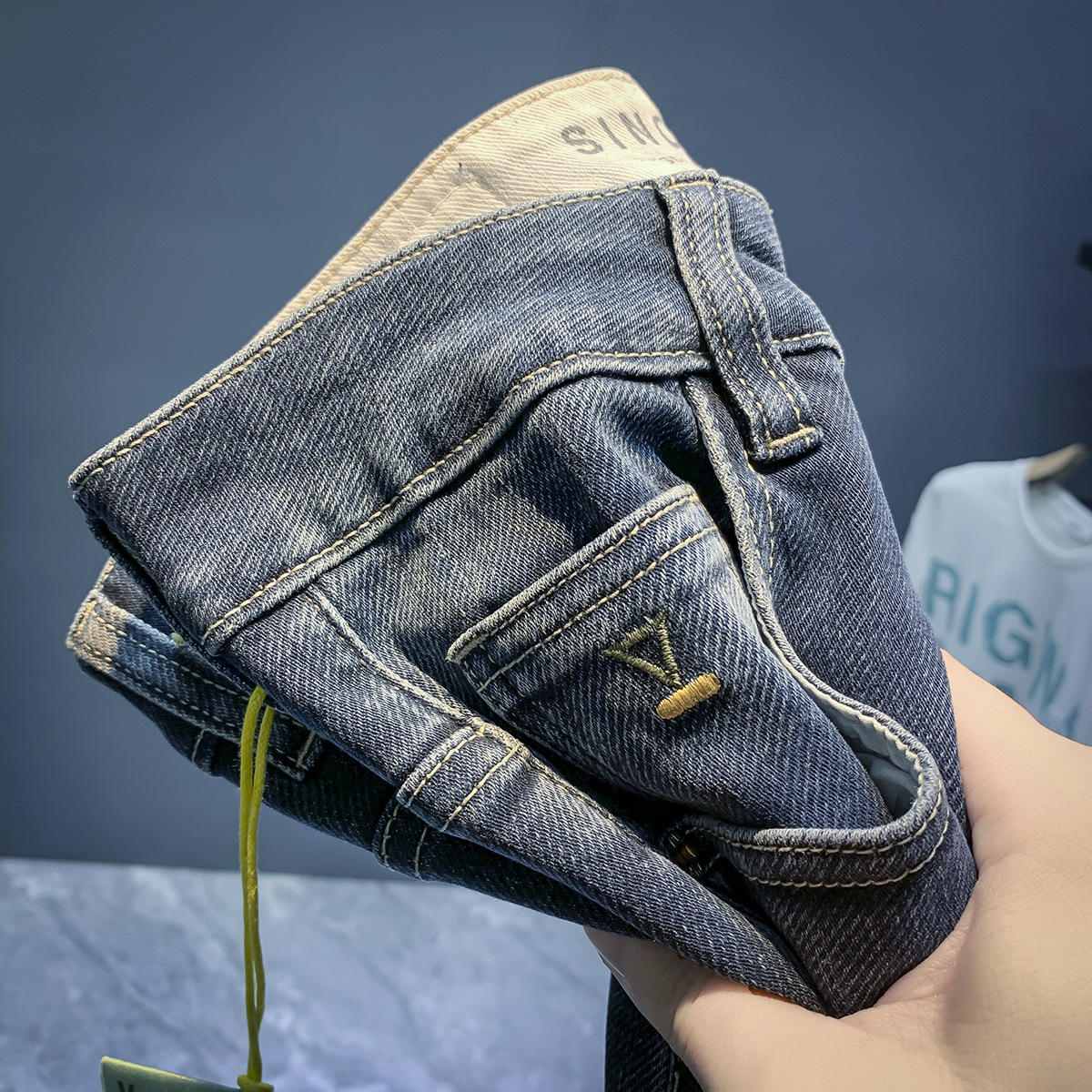 Jeans élastiques de marque de mode européenne pour les nouveaux styles de printemps et d'automne, pantalons polyvalents slim fit haut de gamme pour hommes_voghion.com