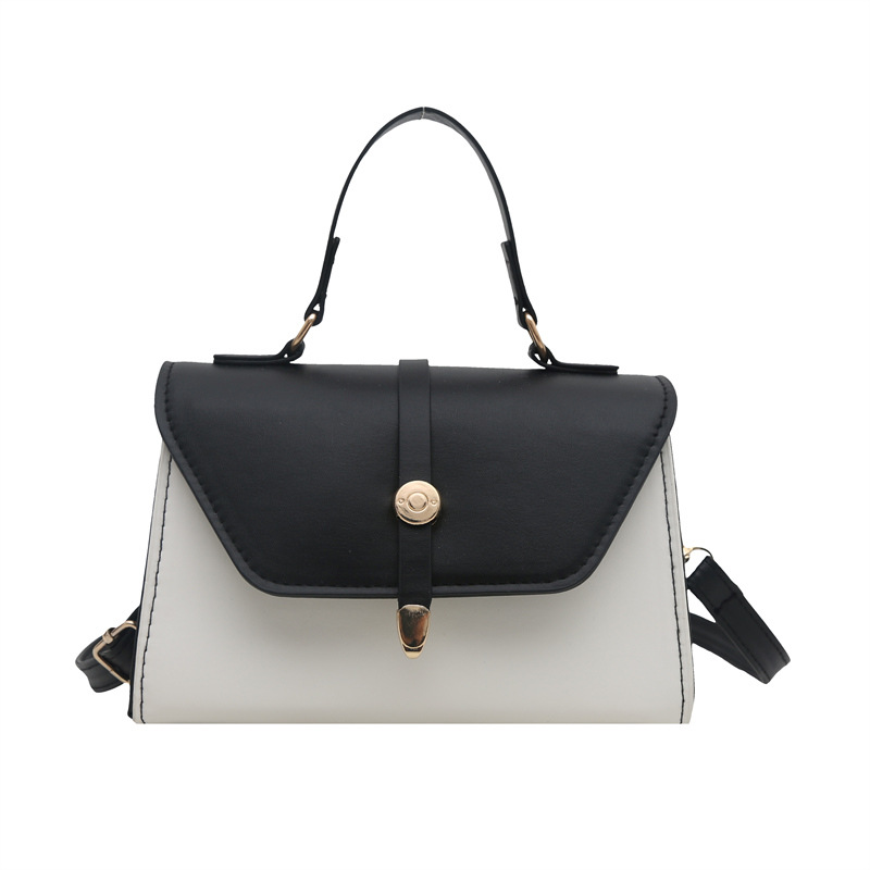 Bolsa de mano de textura de empalme retro para mujeres 2025 nuevo estilo simple y casual de moda extranjera bolso de hombro