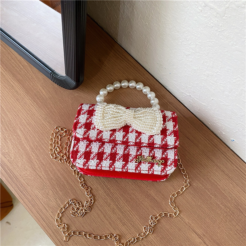 Mochila de niños estilo extranjero princesa perla de viento pequeño cambio bolso de hombro de niña encantadora