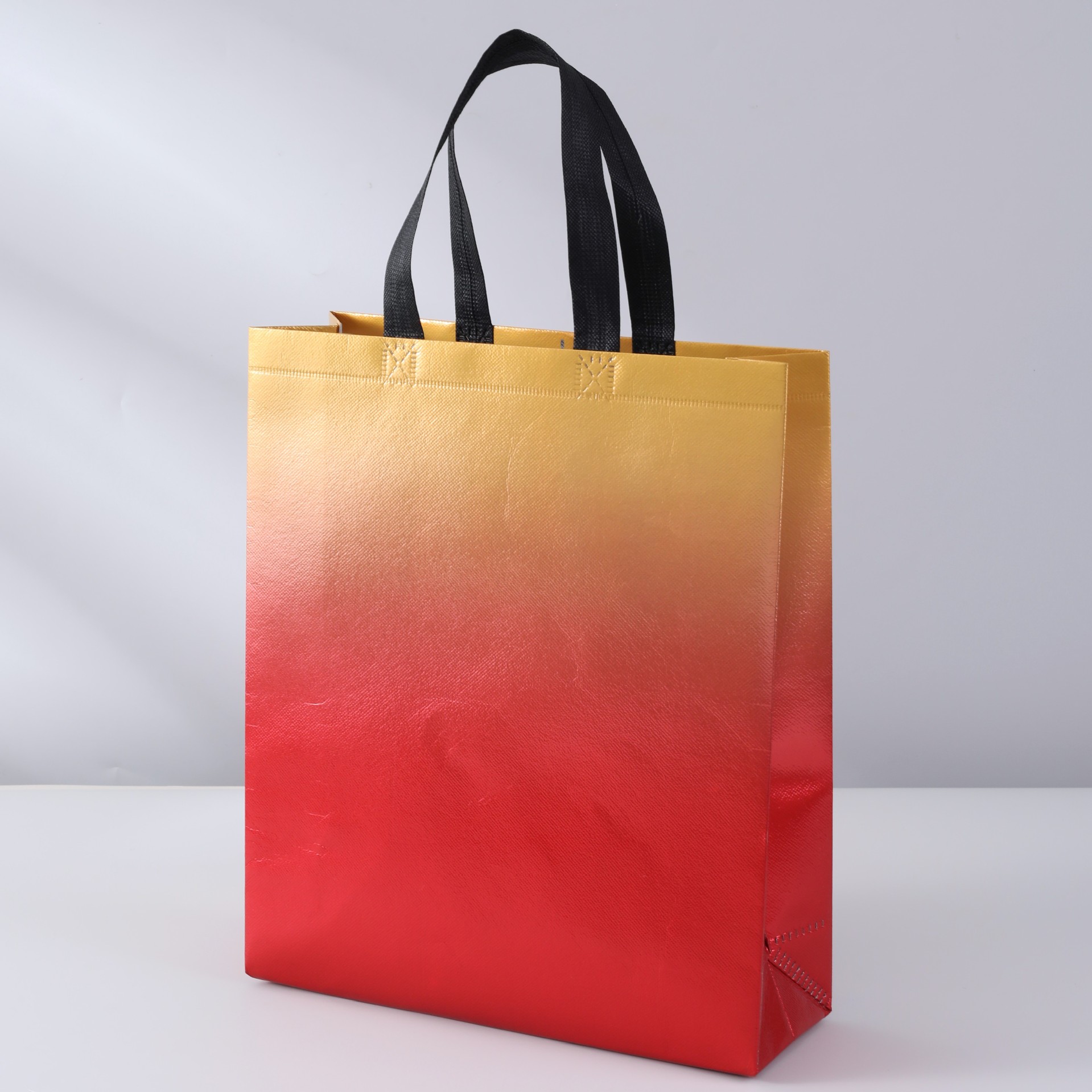 Láser laminado ropa bolsa de embalaje de regalo multicolor no tejido bolsa de publicidad bolso de compras logotipo imprimible