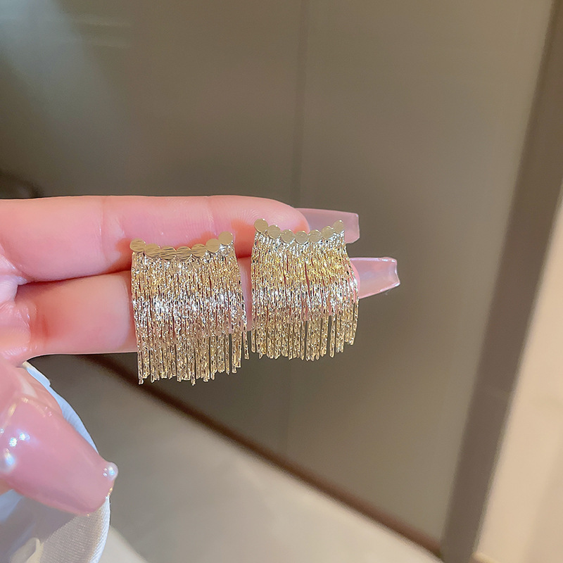 Pendientes de borla de hoja de circón largo de viento de metal con aguja de plata Pendientes de moda exquisita Pendientes de lujo ligero de viento frío