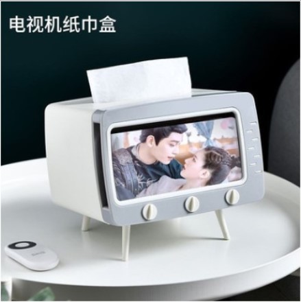 Sala de estar creativa de alta gama caja de pañuelos vintage TV mesa de café caja de pañuelos teléfono móvil de visualización rack de tejido