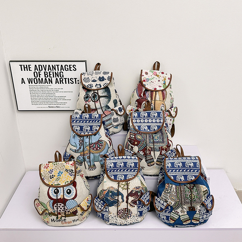 外国貿易の民族風の大きいサイズの肩のリュックサックの刺繍の象の猫のズックの布の包みの女性の旅行は雲南の刺繍の包みを包みます|undefined