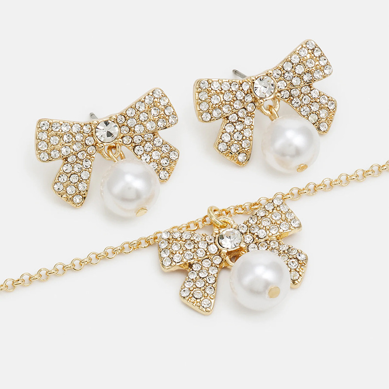 Moda nuevo arco conjunto de joyería de alta calidad collar de diamante de nicho pernos de orejas conjunto de joyería para mujeres