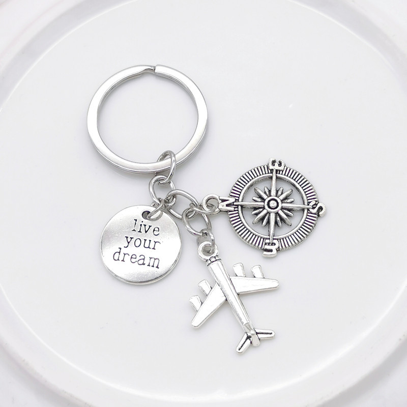 Venta caliente transfronteriza europea y americana bricolaje aleación tierra gran avión viaje llavero de metal temporada de graduación llavero colgante