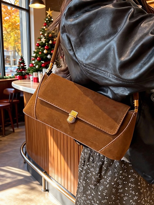 Diseño de nicho de textura transfronteriza de alto nivel bolso de palo de mano para mujeres ventas calientes nuevas bolsas de hombro de estilo extranjero bolsas de brazo de moda image 4