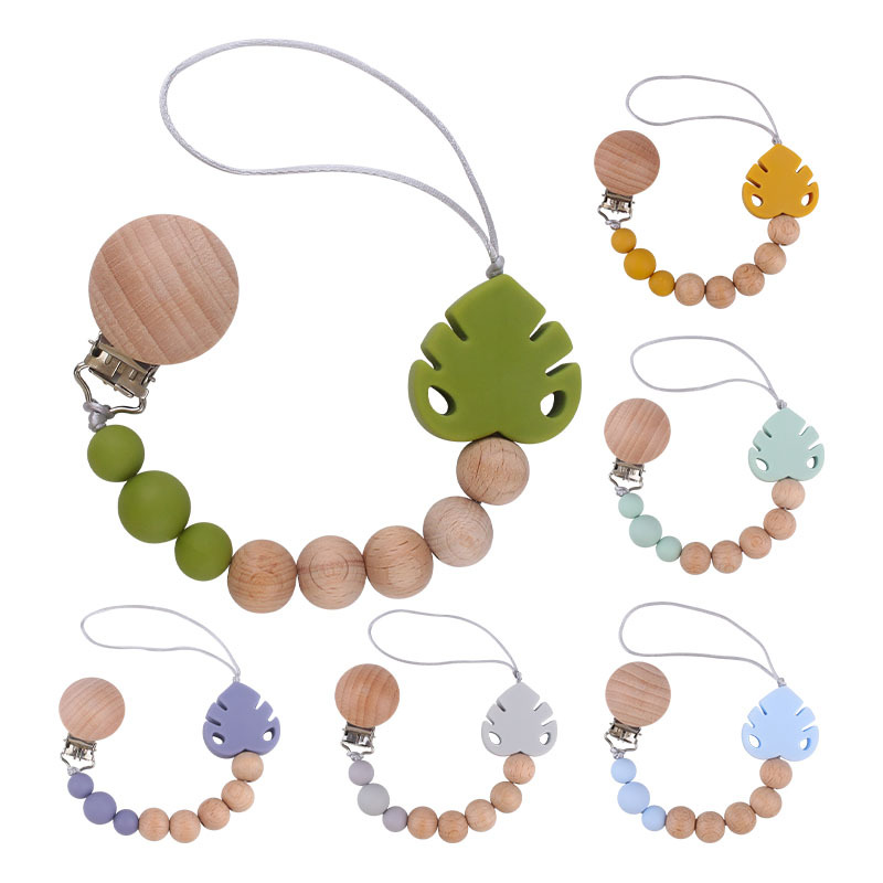 Suministros para bebés creativo haya chupete clip molar juguete mordedor bebé hoja de silicona chupete cadena anti-caída de la cadena