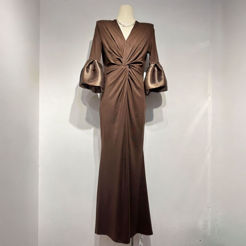 European and American style red V-neck dress with twisted detail, flared sleeves, a fitted waist, and a slimming effect, perfect for evening parties and galas