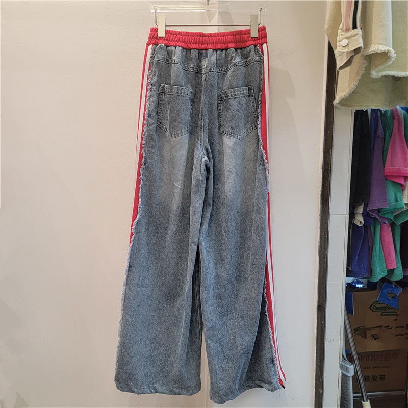 2026 primavera y verano nuevo estilo americano estilo callejero retro empalme jeans letras sueltas pegatinas pantalones largos de pierna ancha
