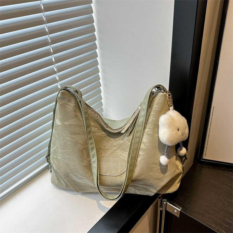 Bolsa de sensación relajada, bolsa de mujer, gran capacidad de verano, 2024, nueva bolsa de viaje de hombro de un solo tipo