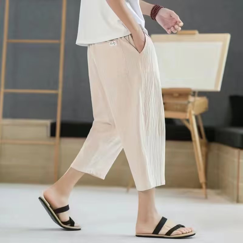 Pantalones cortos de verano, pantalones casuales de lino fino para hombres, pantalones de pierna recta de gran tamaño sueltos de estilo chino, pantalones cortos de playa de algodón y lino, marea