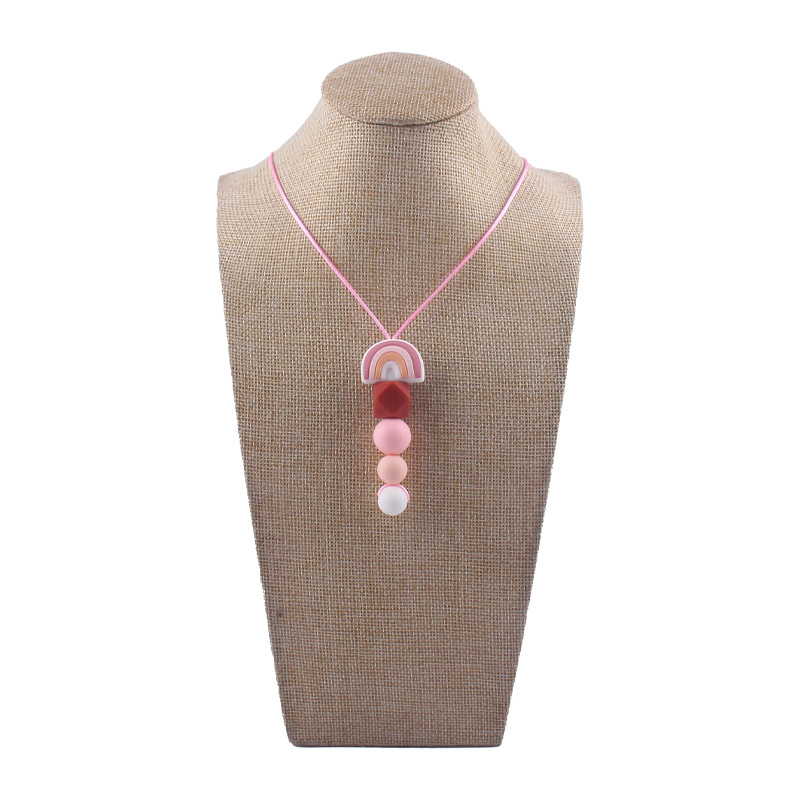 Bebé molar mordedor perlas colgante masticable colgante accesorios de ropa para niños de dibujos animados Arco Iris colgante collar mordedor