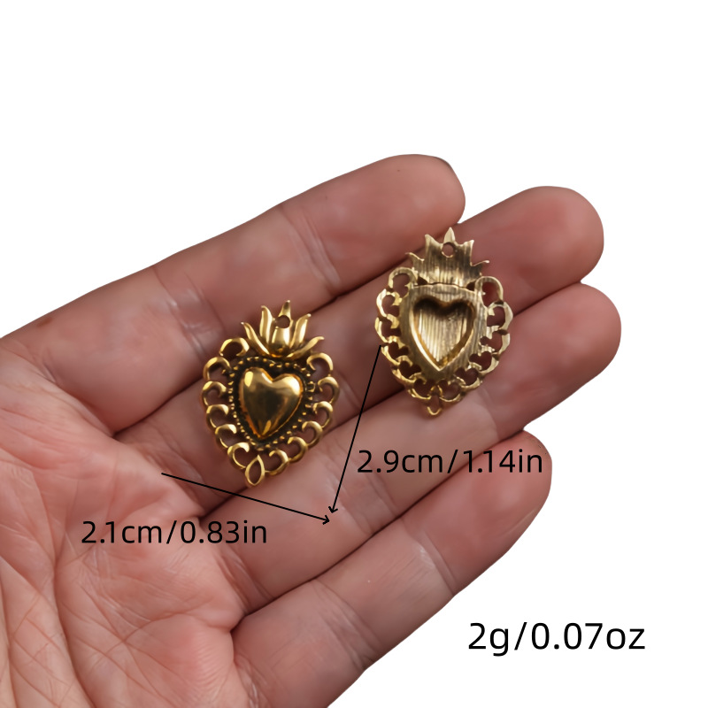 Transfronterizos 10 estilos de oro antiguo colorado colgante de aleación del corazón sagrado DIY encanto joyería accesorios metálicos