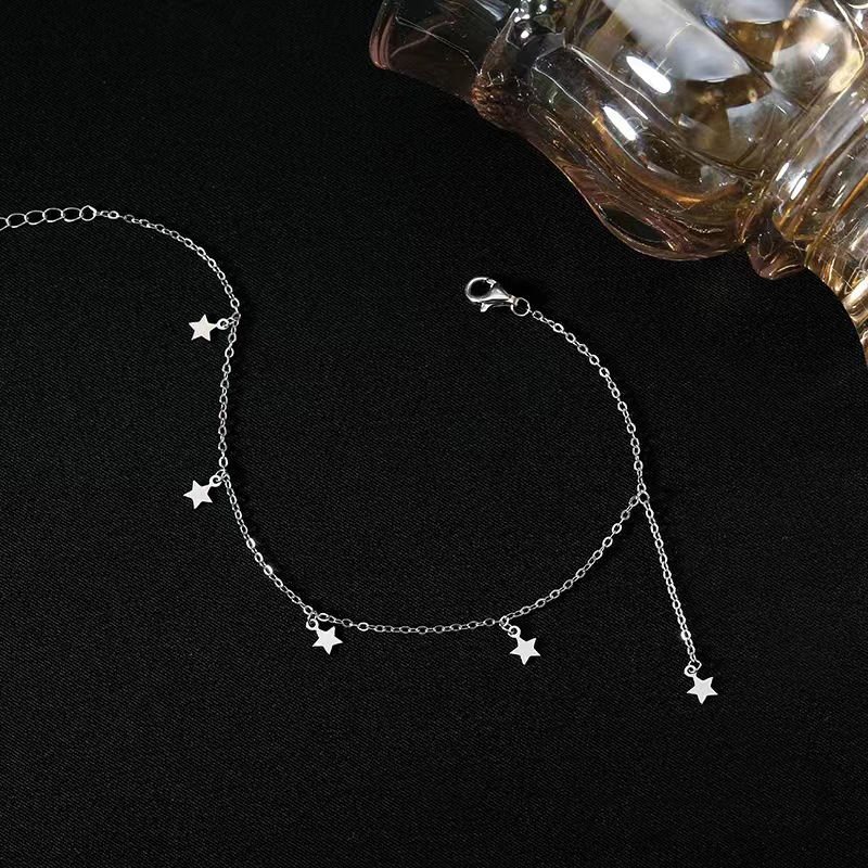 S925 Estrella de plata esterlina borla tobillera para las mujeres nuevo popular en línea rojo de alto grado pie decoración nicho luz lujo estrellado pie cadena