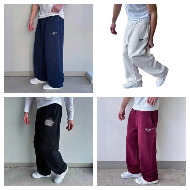 Men's wide-leg athletic sweatpants with embroidered detailing, featuring soft, skin-friendly, and warm fabric, a minimalist design that makes you look taller and slimmer Men's wide-leg athletic sweatpants with embroidered detailing, featuring soft, skin-friendly, and warm fabric, a minimalist design that makes you look taller and slimmer