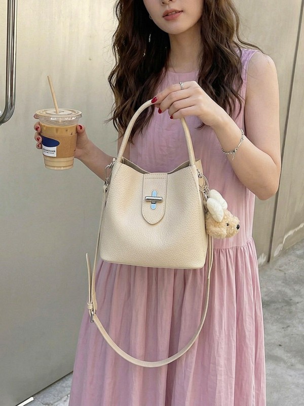 Bolsos de diseño de moda portátil cubo de agua, bolsos de bebé, nuevos patrones de litchi, bolsos de alta calidad prácticos.