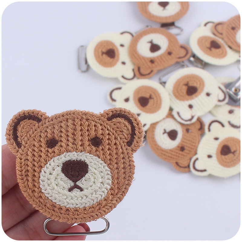 Nuevos suministros para bebés crochet DIY oso cabeza chupete clip bebé oso de dibujos animados clip chupete cadena anti-caída cadena accesorios
