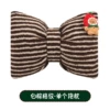One white and brown plaid pillow