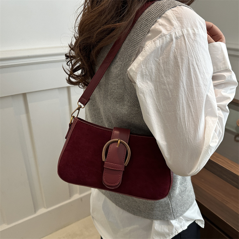 Bolso retro esmerilado para mujeres 2025 verano nueva moda moda de un hombro mochila textura simple bolso de palo