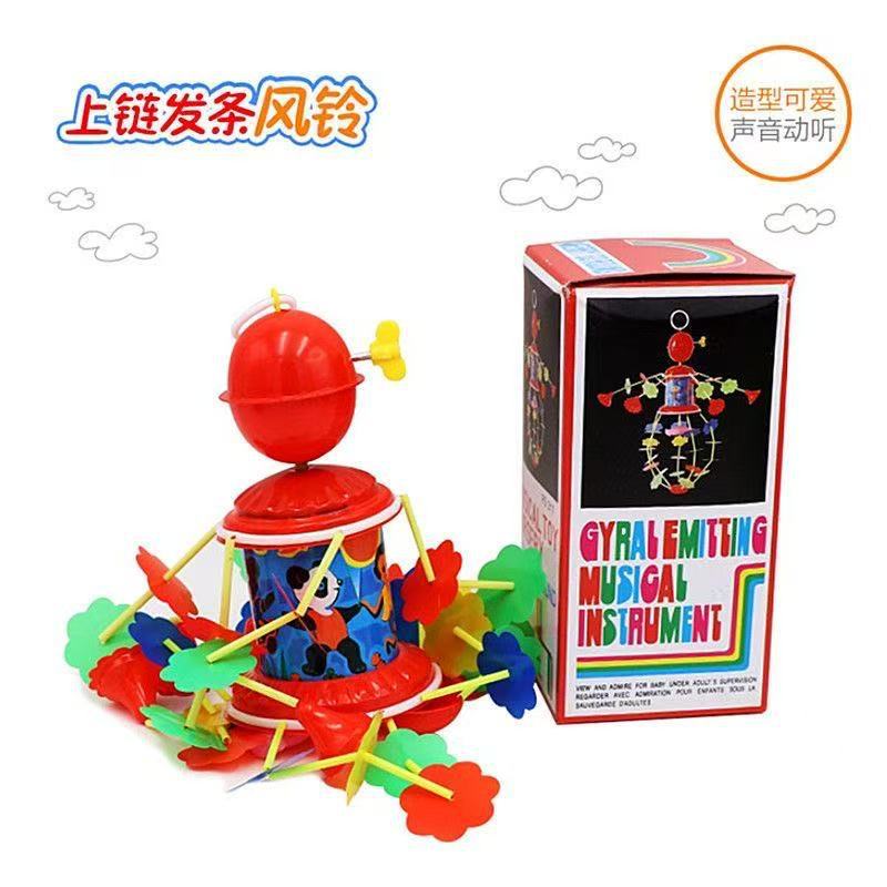 Rotating electric wind-up crib toy