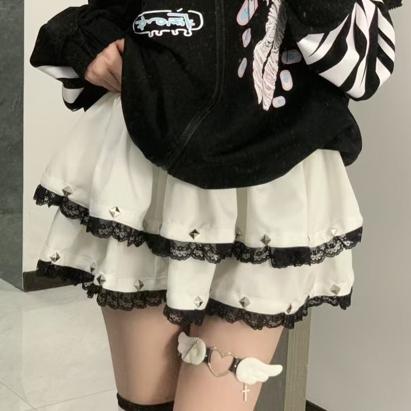 白色蕾丝柳钉裙