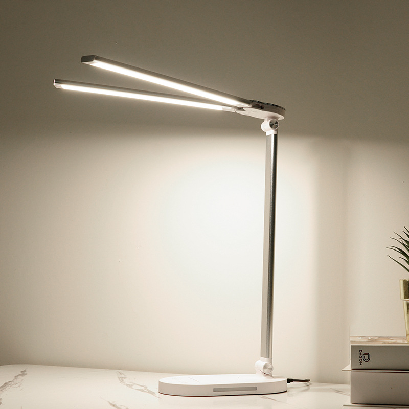 人気のソース双頭デスクランプ折りたたみスマート充電ワイヤレス充電学習読書デスクランプピアノ目の保護デスクランプ