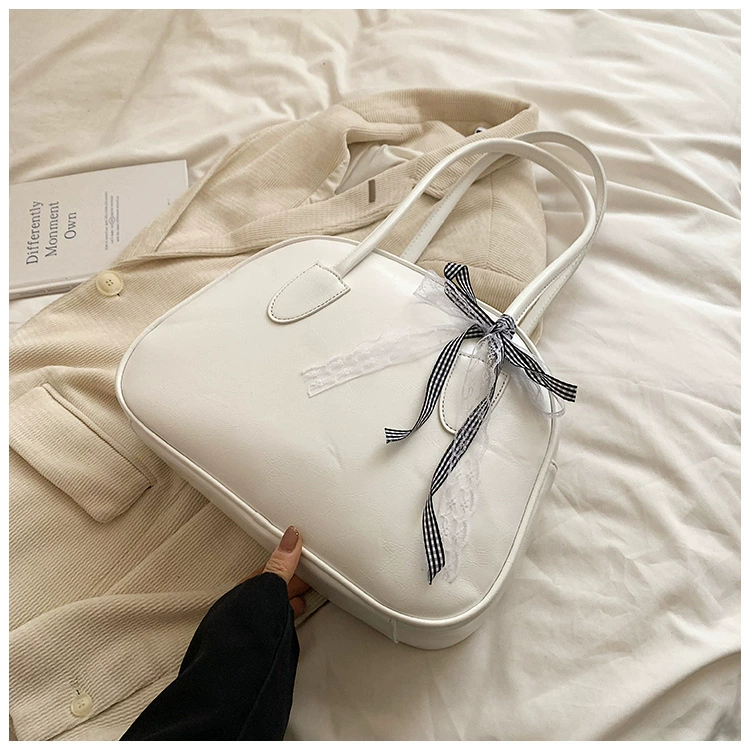 Small design handheld one-shoulder bag with bow, South Korea
