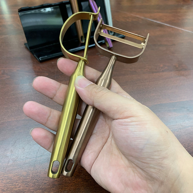 ステンレス鋼の皮むきナイフ家庭用メロン皮むき器ジャガイモとニンジンの皮むきツール多機能野菜と果物の皮むき器|undefined