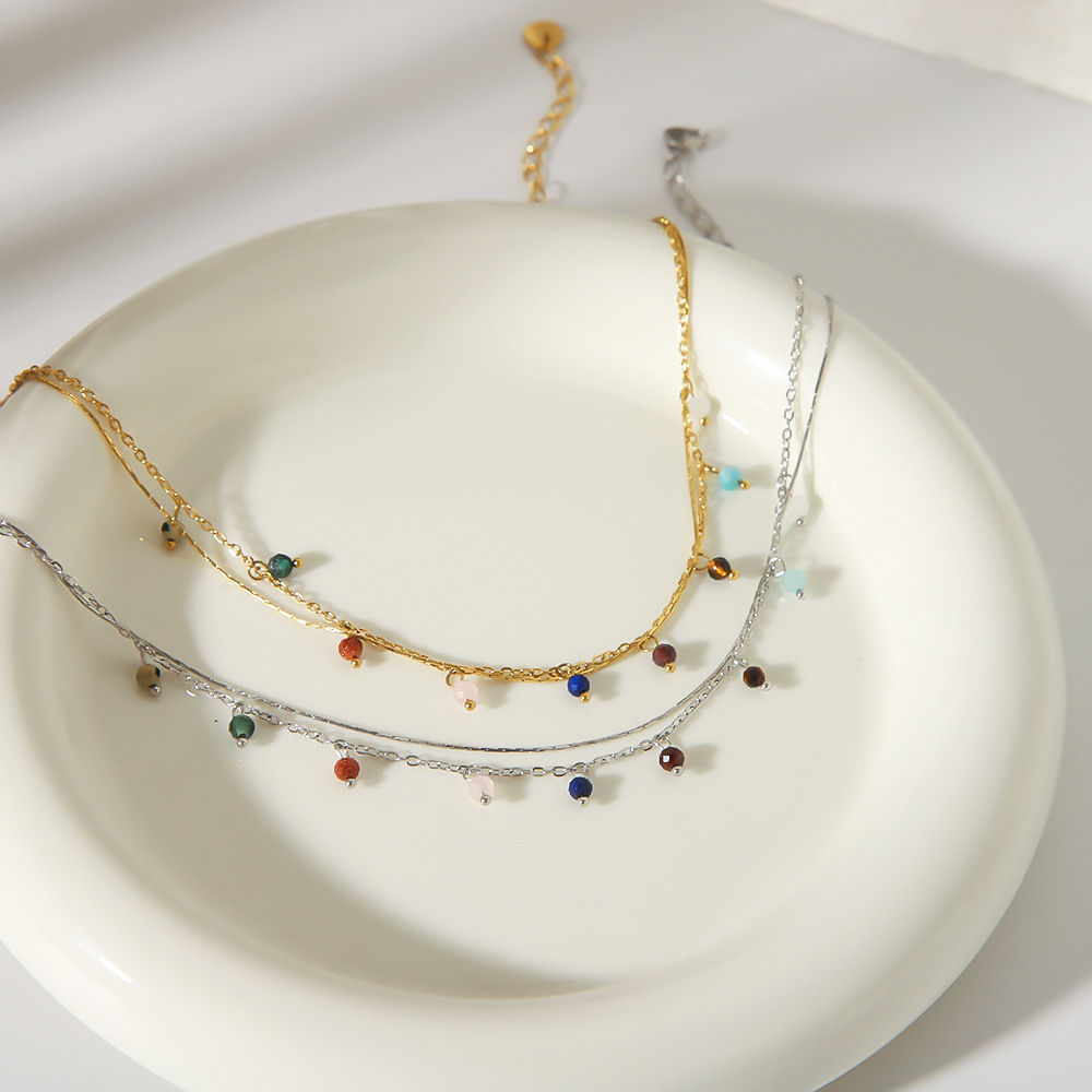Estilo bohemio nuevo color de acero de titanio colgante de borla de jade natural doble tobillera casual adorno de pie chapado 18K