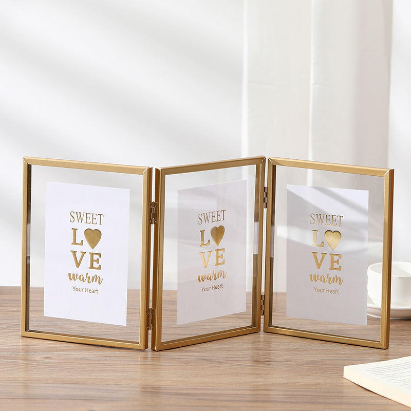 Foldable metal triple photo frame creative golden black photo decorative frame 4-inch 6-inch 7-inch ornaments Foldable metal triple photo frame creative golden black photo decorative frame 4-inch 6-inch 7-inch ornaments