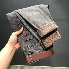 品質の9分のジーパンの男性の新型の秋のファッションの弾力の潮流はゆったりしています。
